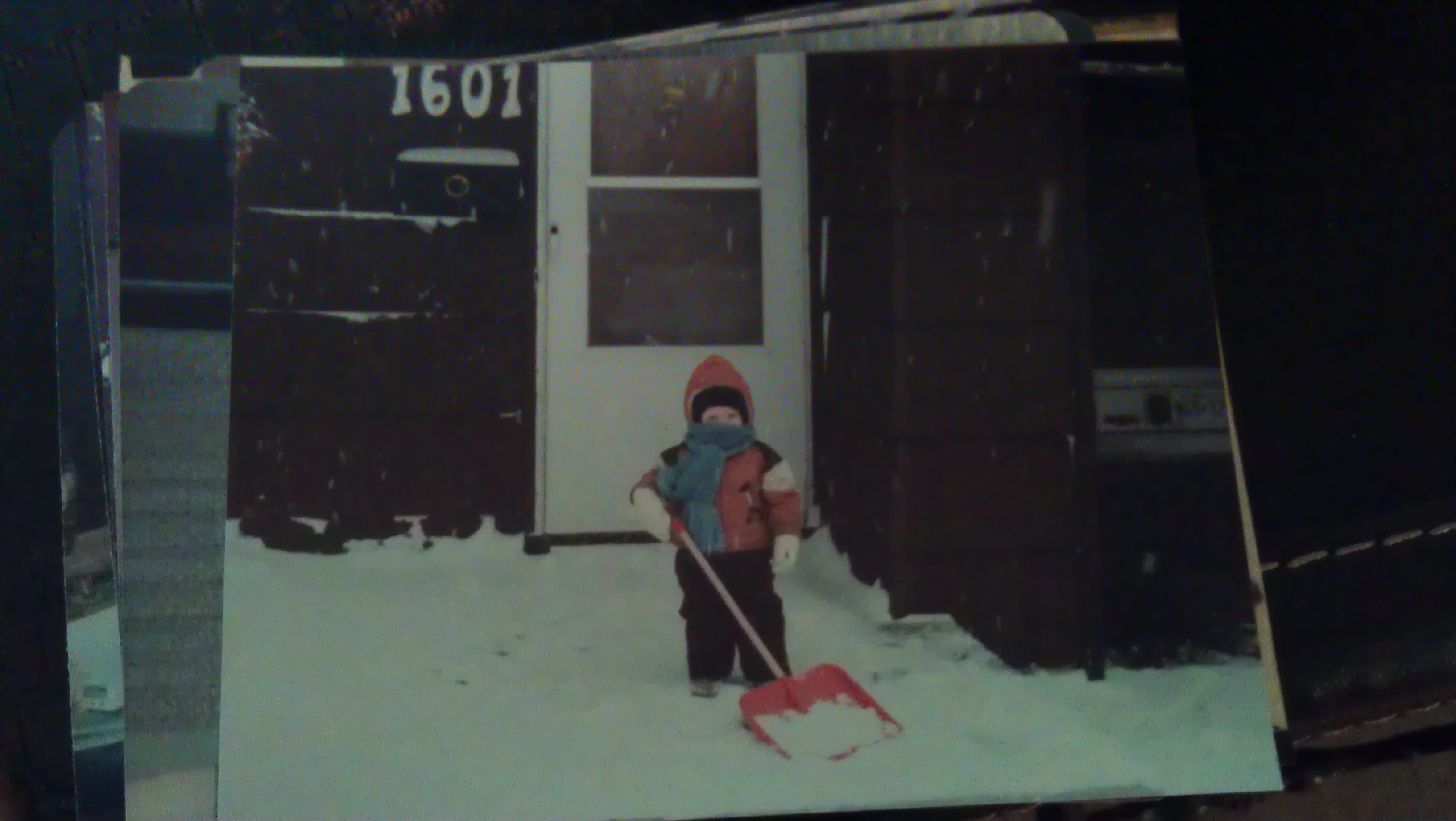 3/20/2012 little J in snowsuit