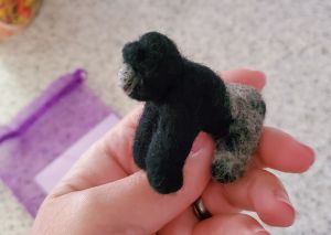 felt gorilla with silver gray fur on back legs